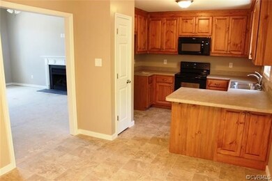 Custom kitchen leading to Vaulted Great Room with