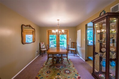 Dining room with French doors leading out to a won