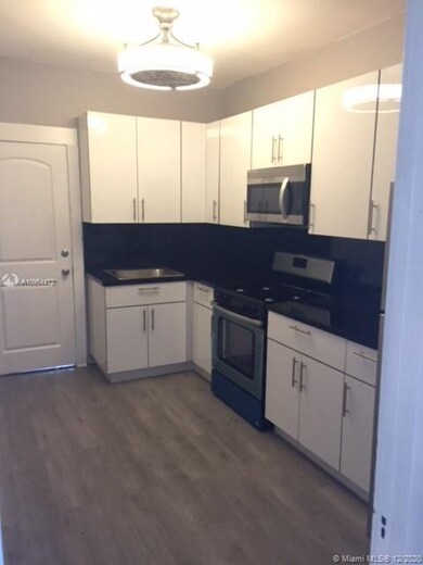 Brand new kitchen cabinets and new SS appliances.