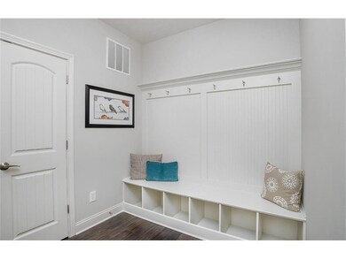 Photo is a model home photo or artist rendering due to construction stage and may be of the same model but possibly at a different location.