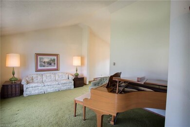 Vaulted ceilings in the living room and dining roo
