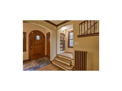 Front door and stairway to the 2nd floor.