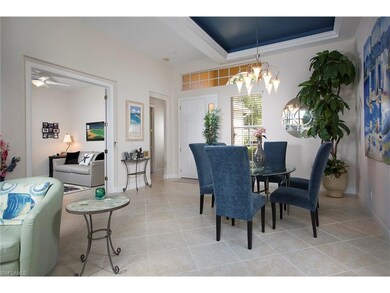 Front door enters into living room and den on the 