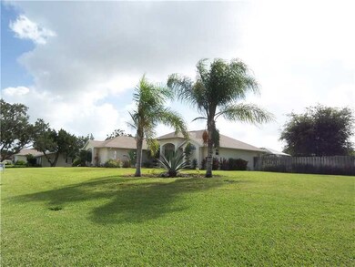 Exterior Front. 3/4 acre fenced corner lot
