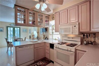 This well laid out cheery kitchen is great for coo