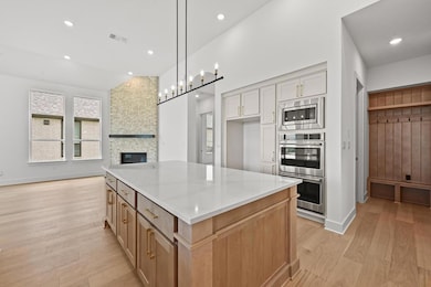 Kitchen featuring appliances with stainless steel