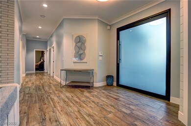 oversized glazed glass entry into an outstanding g