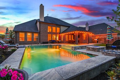 Beautiful pool and spa with a fire pit!