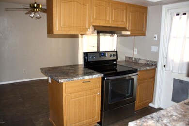 OPEN KITCHEN VIEW C INTO DINING AREA