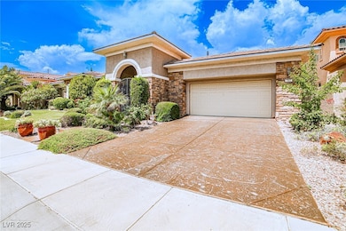Mediterranean / spanish-style house with stone sid