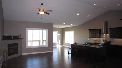 Great room, view to kitchen & dining