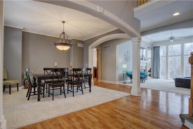 Spacious dining room with detailed arches.