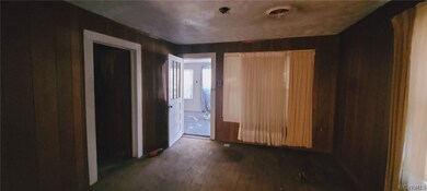 Corridor with dark wood-type flooring