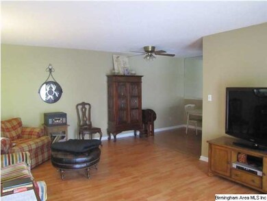 Nice den with large window.  The den has laminate 