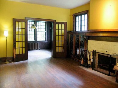 Living Room. 14x20.  Built-ins flank fireplace, po