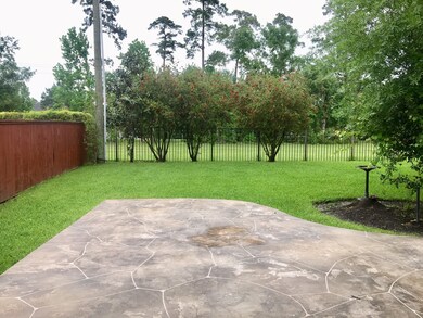 Large private backyard with mature tress and tons