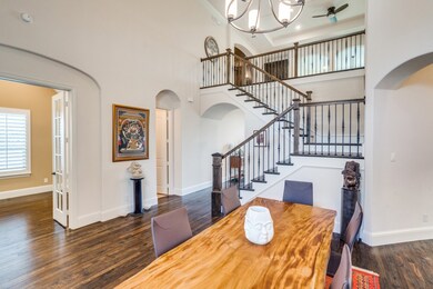 Formal Dining at the entrance showing the staircase wrought iron spindles