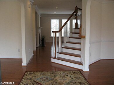 Foyer - Welcoming foyer with hardwood floors, form