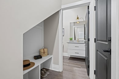 Tucked away Nook at Garage Door Entryway and Powder Room.