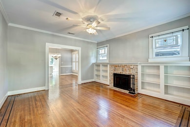 Another view of the living room going into the formal dining room.