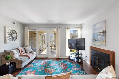 Living room with dark hardwood / wood-style floori