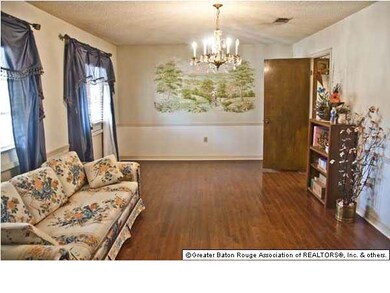 Next is the gigantic formal Livingroom/Diningroom 