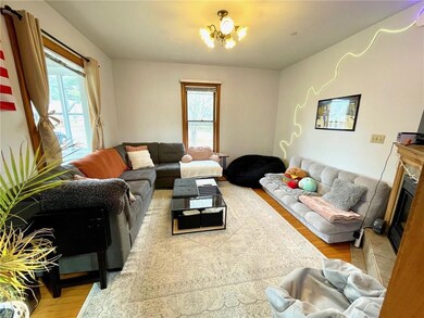 Living room area with hardwood floors.