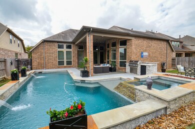 Luxurious heated lap pool with a spa.