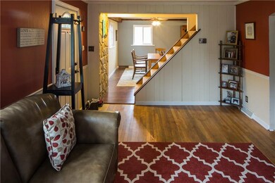 OPEN FLOOR PLAN--LIVING ROOM, ENTRY WITH NEW DOOR,