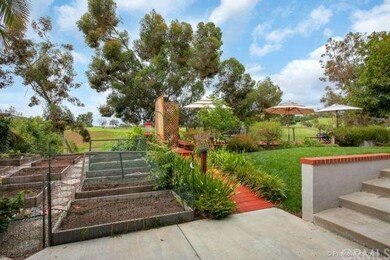 Another view of the fenced garden.