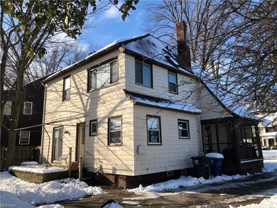 Rear Elevation sweeps around to Screened Porch ...