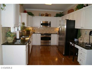 Kitchen - The kitchen has been updated with granit