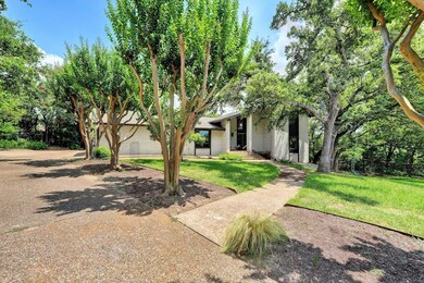 Mid-century inspired home featuring a front lawn