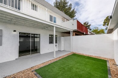 View of yard featuring a patio, a fenced backyard,