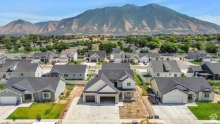 Aerial view of residential area with a mountain backdrop