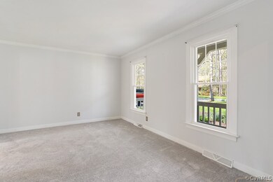 Formal living room with NEW carpet.