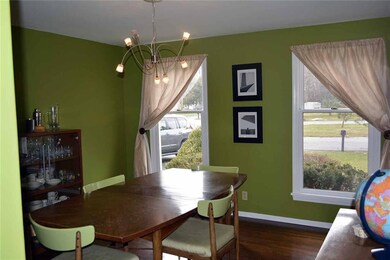 Formal Dining Room - Gleaming wood flooring & chan