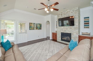Beautiful floor to ceiling Limestone Gas Remote Fireplace with Built-in Cabinets on each side