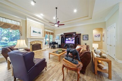 23x20 FAMILY ROOM  Great size with picture windows, fireplace and tray ceiling.