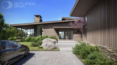 The formal front entrance offers water views as guests approach the home - as envisioned by the architectural rendering.
