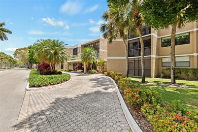 16400 Golf Club Rd unit 104, Weston, FL 33326 - photo 2