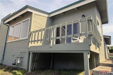 Rear of unit with deck at dining area
