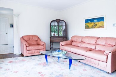 The living room sits just to the right of the cera