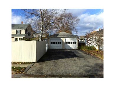Exterior Back. 2 CAR GARAGE WITH 4 CAR DRIVEWAY