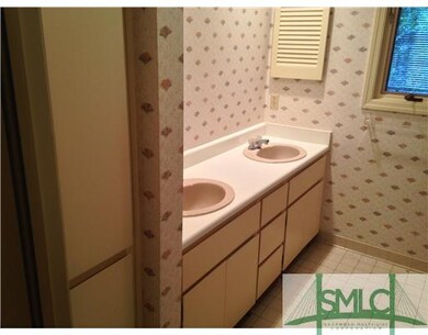 Bathroom. Double sinks and plenty of light.
