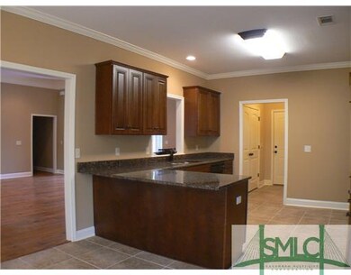 Exterior Front. The cabinetry, wall color, and cer