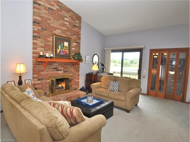 Great rm has dramatic brick gas log fireplace.  Sl