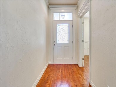 Natural light and stunning wood floors upon entry.