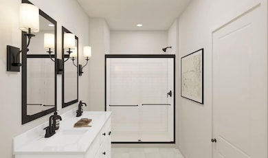 Primary bath with glass shower enclosure