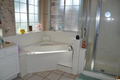 Bathroom featuring independent shower and bath, va